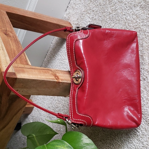 Coach Handbags - Coach cherry red leather turnlock clutch wristlet